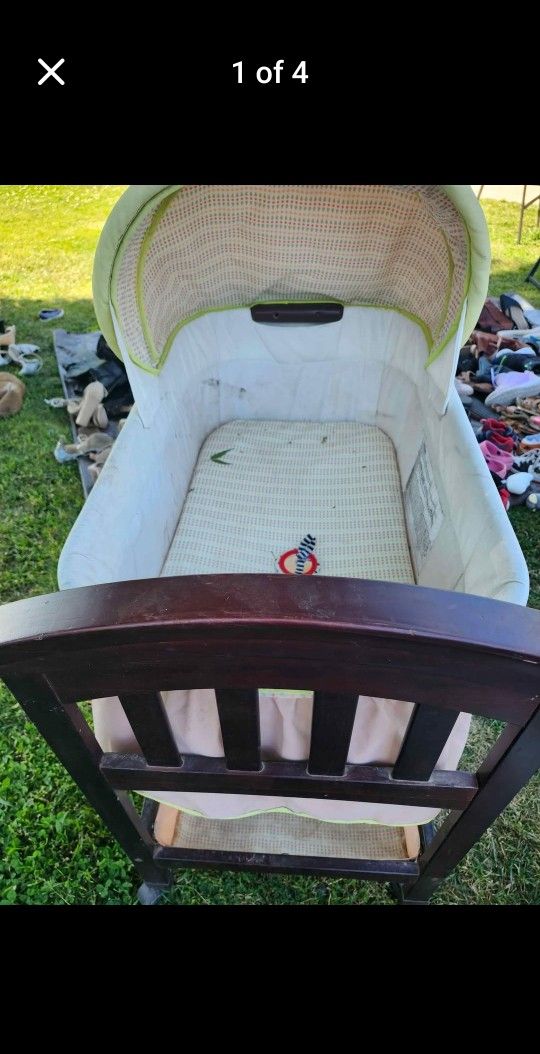 Bassinet,  Wood  Frame with Wheels.