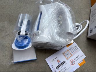Portable handheld clothing steamer