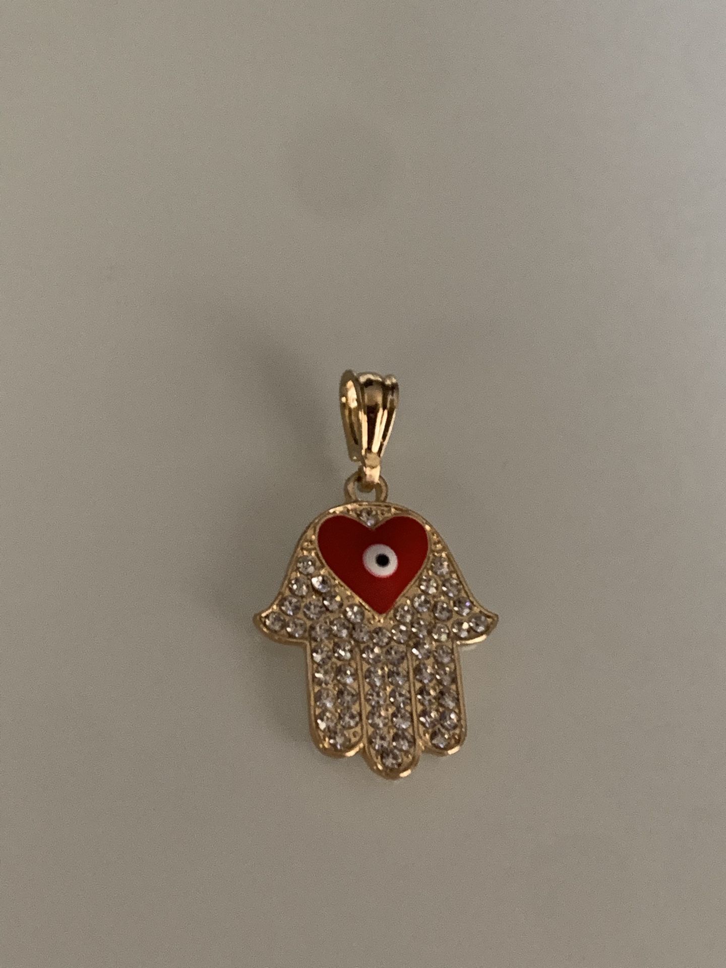 Hand of Fatima pendant with rhinestones in gold plated