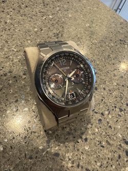 Citizen rx (satelite time w/ solar eco)