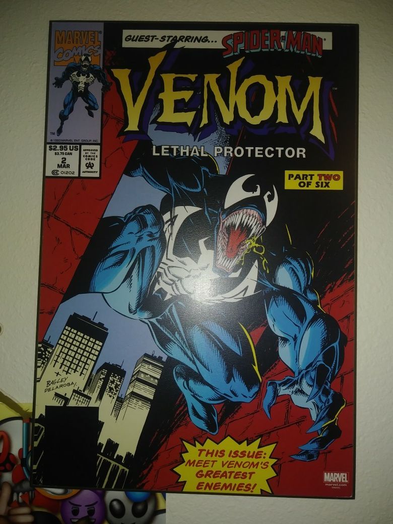 2 new Spiderman and Venom wood wall canvas. 30.00 for both.