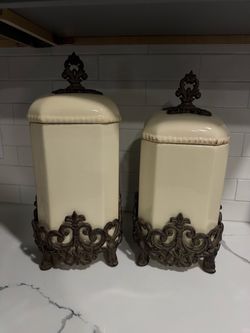 Vintage Tuscan French Country Cream Ceramic Canister Set with Ornate Metal Scrollwork & Fleur-de-Lis Finials