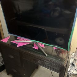 Smart Television AND Wood Desk With Glass Top