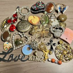 Vintage  Pendants and trinkets. These pendants and trinkets are small. As is. No returns. What you see is what you get. Make me an offer I can’t refus