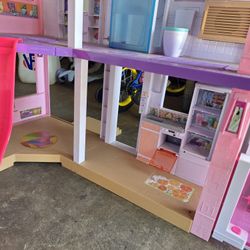 Barbie dollhouse with assessors