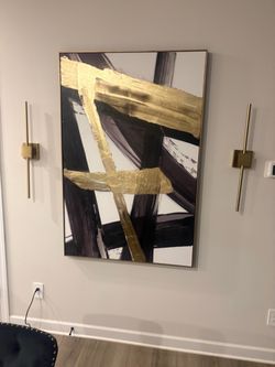 Great deal on heavy duty white glass table with gold and black chairs with rug and picture