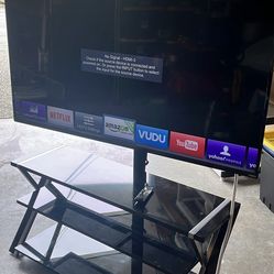 65” TV with Floor tv stand.