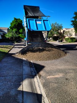 Skid steer and truck