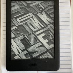 1 Year Old 8 gb Rarely Used Amazon Kindle (No Ads)with a Built-in Front Light
