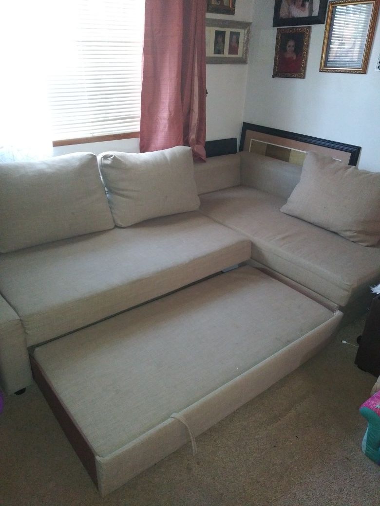 L shaped couch with storage room