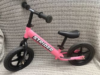 Pink kids balance bike strider