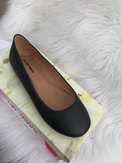 Black flats . Size 6