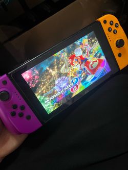 Nintendo Switch Console with Mario Kart 8 racing game downloaded digital game
