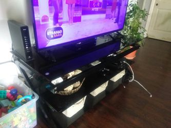 Glass TV stand very nice only used for 2 months