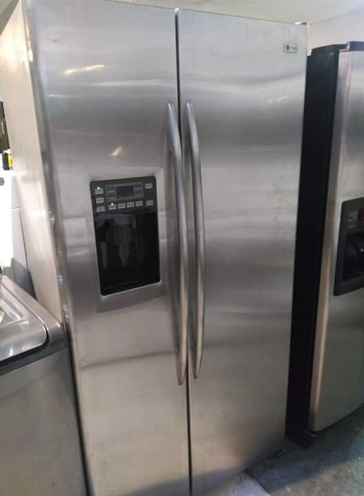 Stainless steel side by side refrigerator. $499