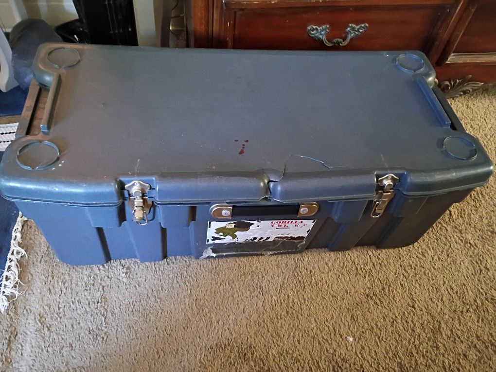 Large Storage Container On Wheels And Locks In The Front