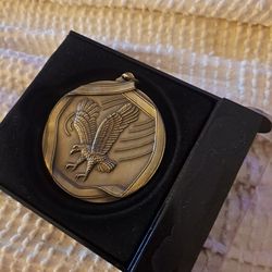 Is an eagle coin medallion