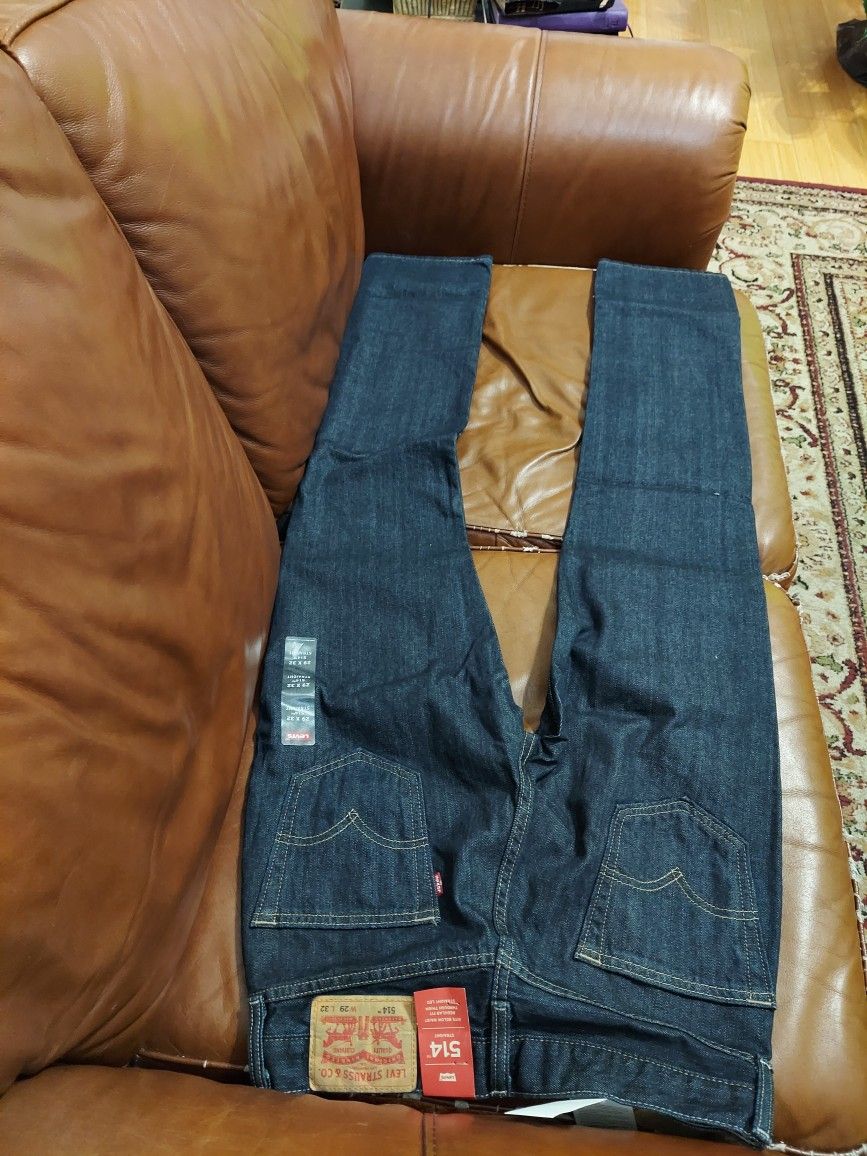 Two Pairs Of Stretch Levi Jeans. 