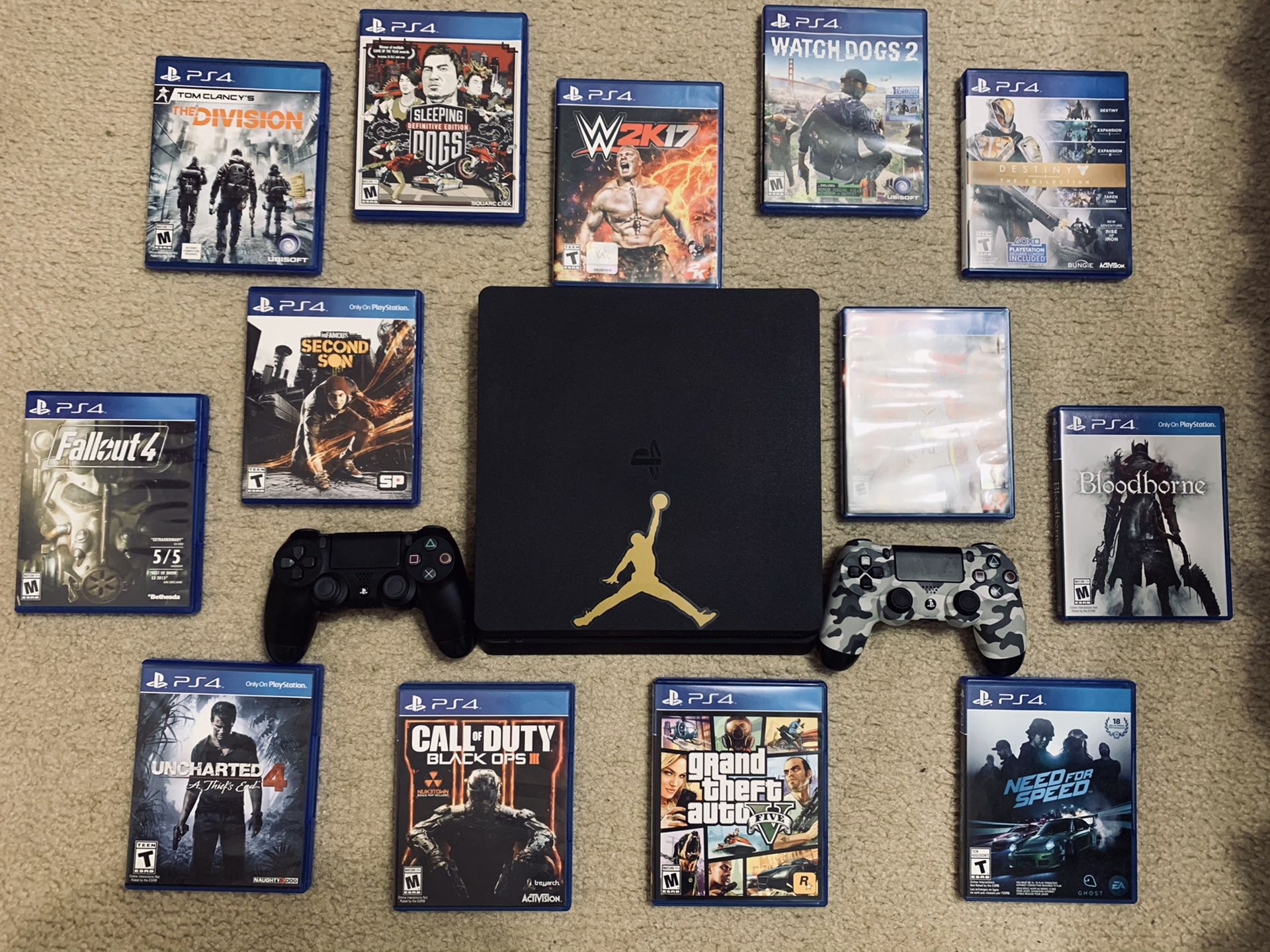 PS4 w/ 2 controllers & charger + 13 games