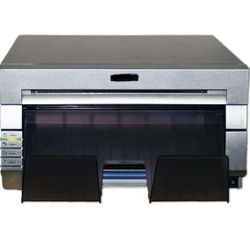 DNP Printer. Prints Up To 400 Prints Per Roll