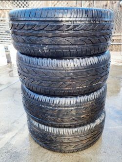 Four 20" Good Treaded Tires