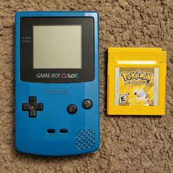 Teal Gameboy Color With Pokémon Yellow And Bass Masters Fishing Game 