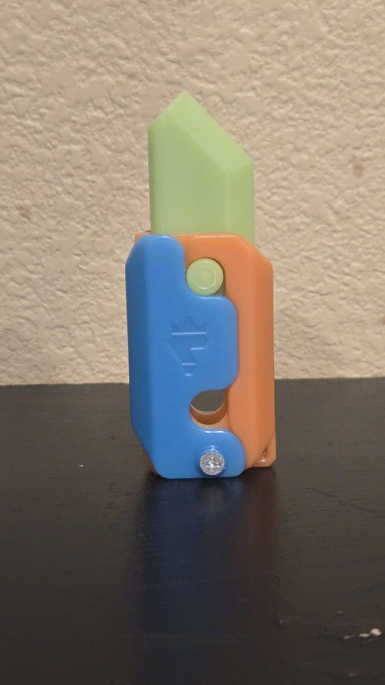 3D Printed Fidget Carrot Knife Toy Orange Green And Blue