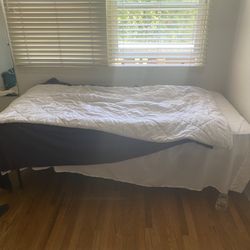 Twin bed with mattress and frame 