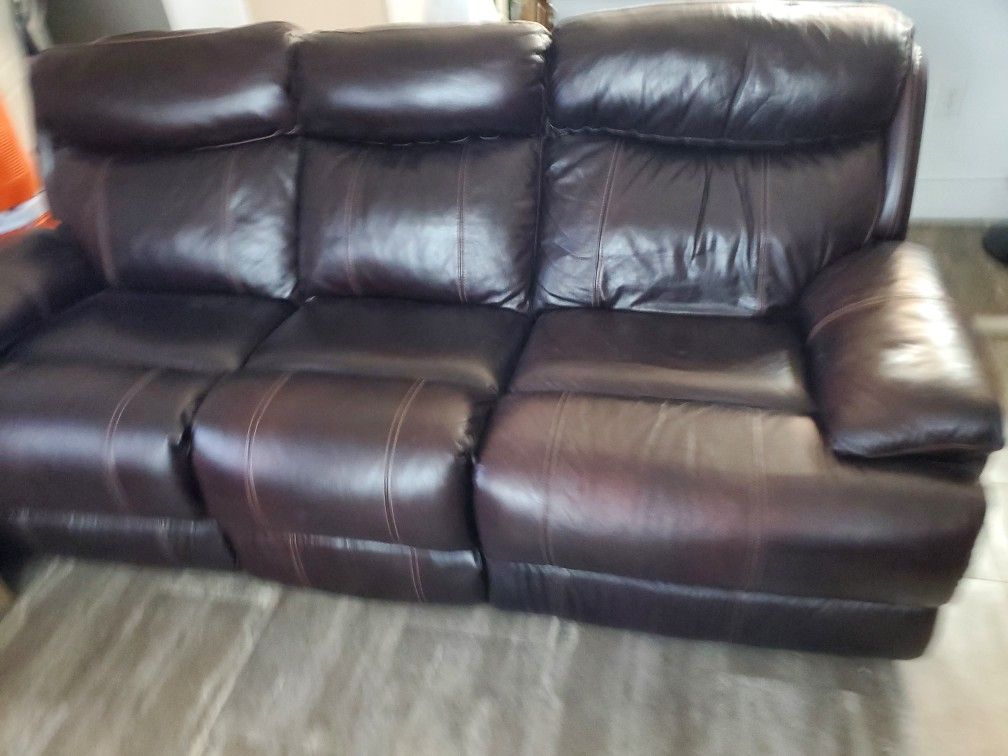 Faux leather recliner and sofa couch