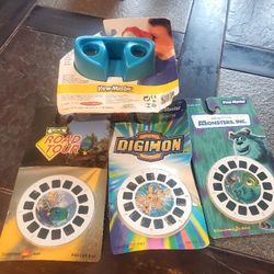Vtg 1999 Solid Blue w/ Green Lever View-master Viewer w/ 9 reels
All New ! 
USA ROAD TOUR 
DIGIMON
MONSTERS INC. 