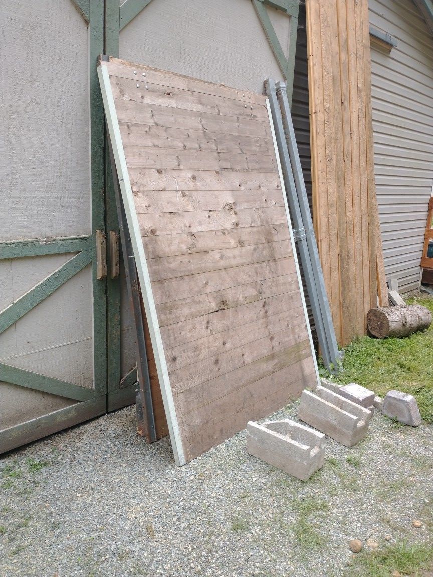 2 Rolling barn doors with tracks & 14 tongue and groove stall devider timbers.