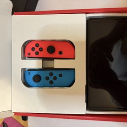 Nintendo Switch OLED w/ 4 Joy-Con Controllers