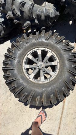 34x10-15 Razor tires and rims