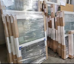 White Vinyl Double-Hung Windows New in Packaging