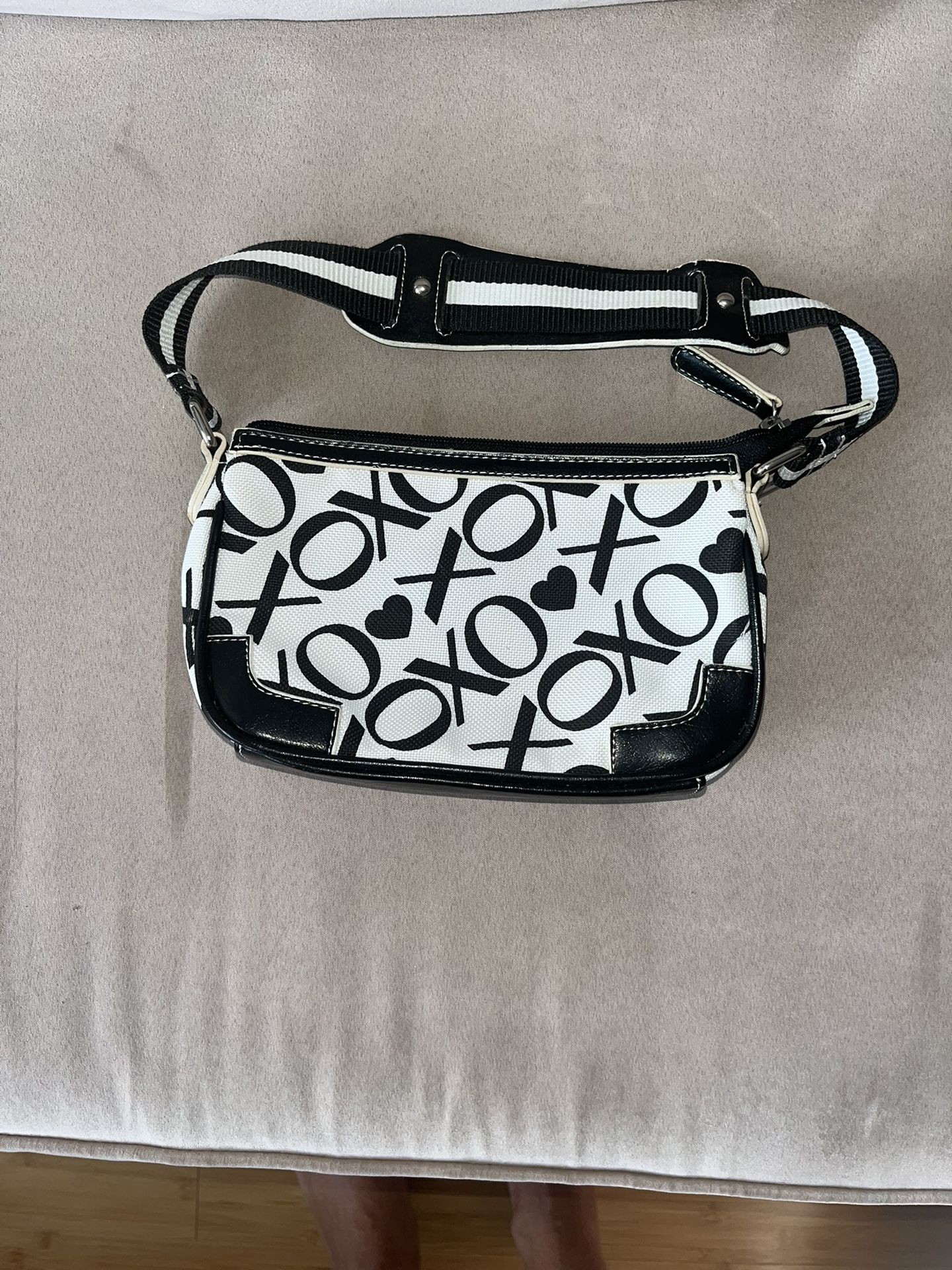 XOXO Mini purse 9x5 . In good condition. Great to put make up in.