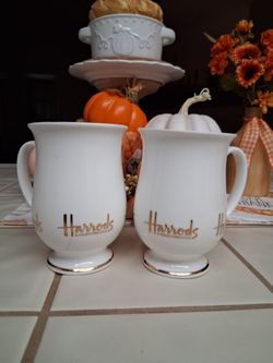 L😎😎K! TWO ~ HARRODS KNIGHTSBRIDGE footed coffee hot beverage MUG cup. PAIR ( x2 ) with Gold Trim Logo....asking $20.00