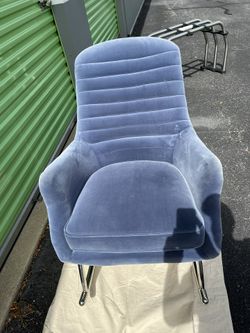 MOE’S HOME COLLECTION ROCKING CHAIR   $650