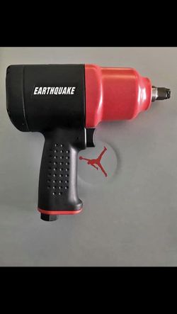 Heavy duty 1/2 in. impact wrench with a composite body to reduce vibration