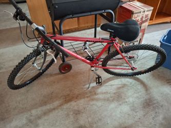 Mountain bike and bike hauler that slips into a receiver on a hitch