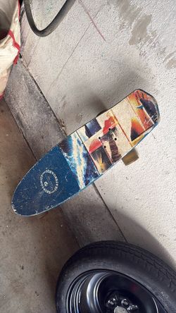 The skateboard is a blue Kryptonic skateboard