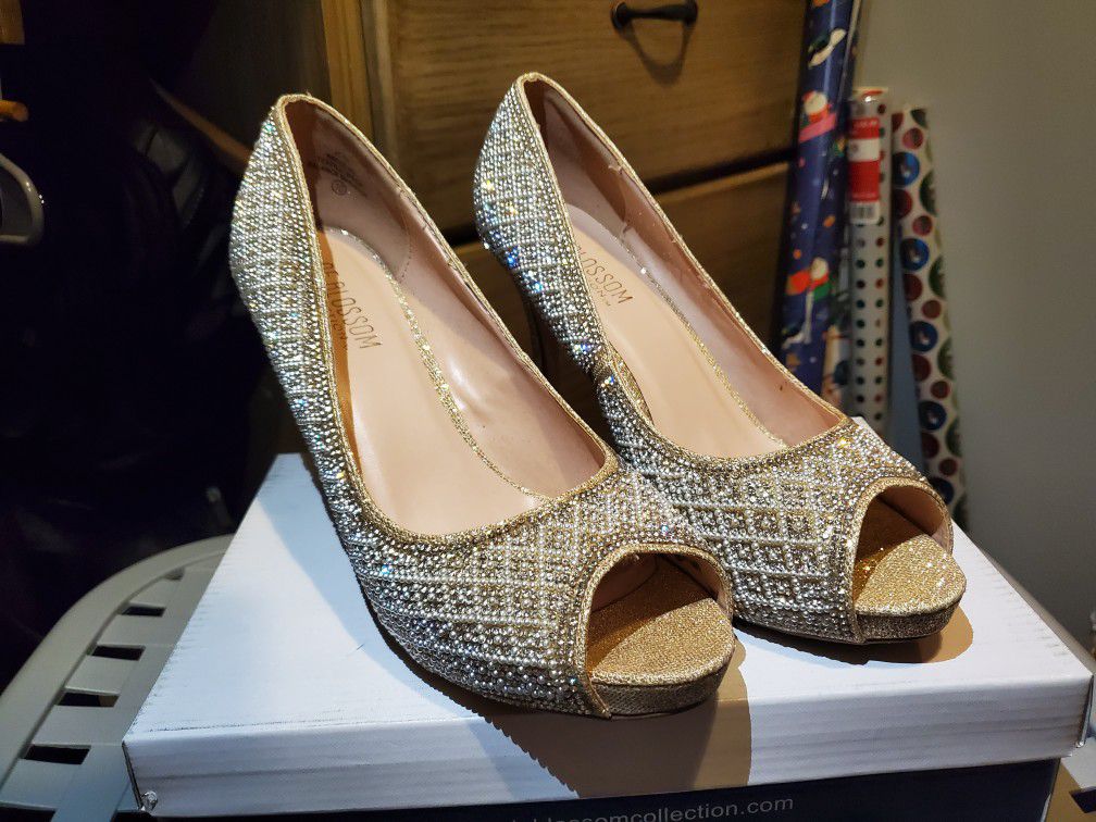 Golden pearl heels
