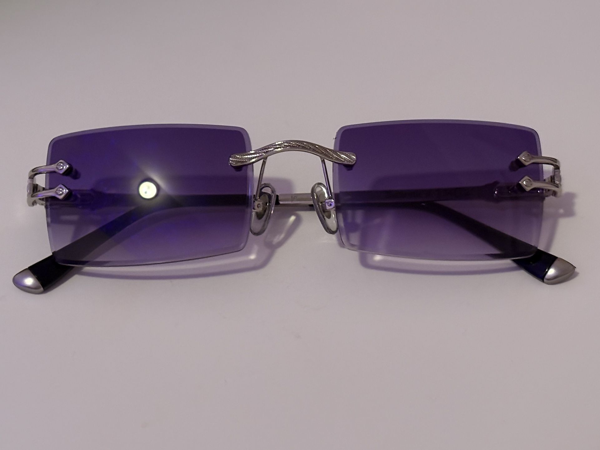 JAMES ORO Authentic II Sunglasses. Silver Frame. Purple tint