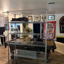 Metal storage rack with wheels