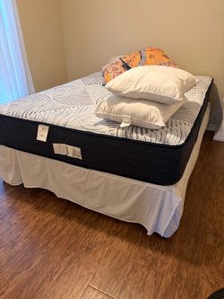 Queen Mattress, Box spring and frame. Barely used
