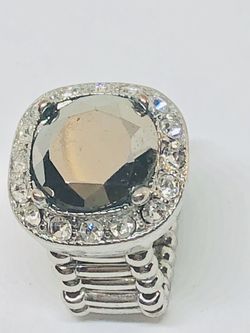 Fashion ring with crystals and silver tone