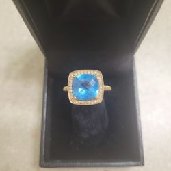 Maui Divers 14 K Gold Blue Topaz And Diamonds Ring.  Weight Is 5.1 Grams