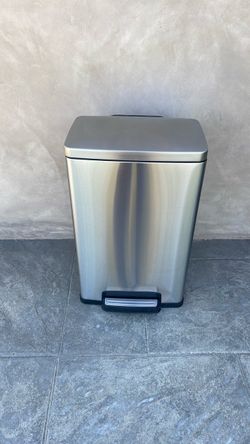Stainless steel trash can.