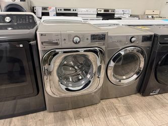 LG stainless steel frontload washer and dryer set electric with warranty