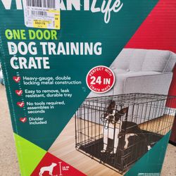 Dog crate with bed and boots
