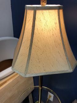 Very nice lamp gold only the lampshade was 1999 from Walmart very clean almost new